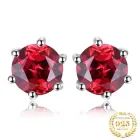 Срібні жіночі сережки-гвоздики 925 проби із кристалами гранату "La Mysterious garnet"