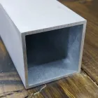 Труба квадратна алюмінієва 100х100х3 анод срібло, деталь 0,5 метри