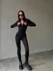 Жіночий еластичний комбінезон на флiсi чорного кольору 34475 42/44